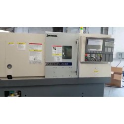 OKUMA Aquí tienes la traducción al catalán:

GENOS L400 - Torns multifunció